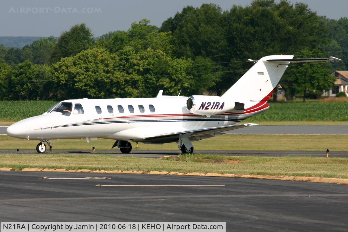 N21RA, 2002 Cessna 525A CitationJet CJ2 C/N 525A-0092, Most arrivals have to throttle up a bit to climb the hill to the ramp.