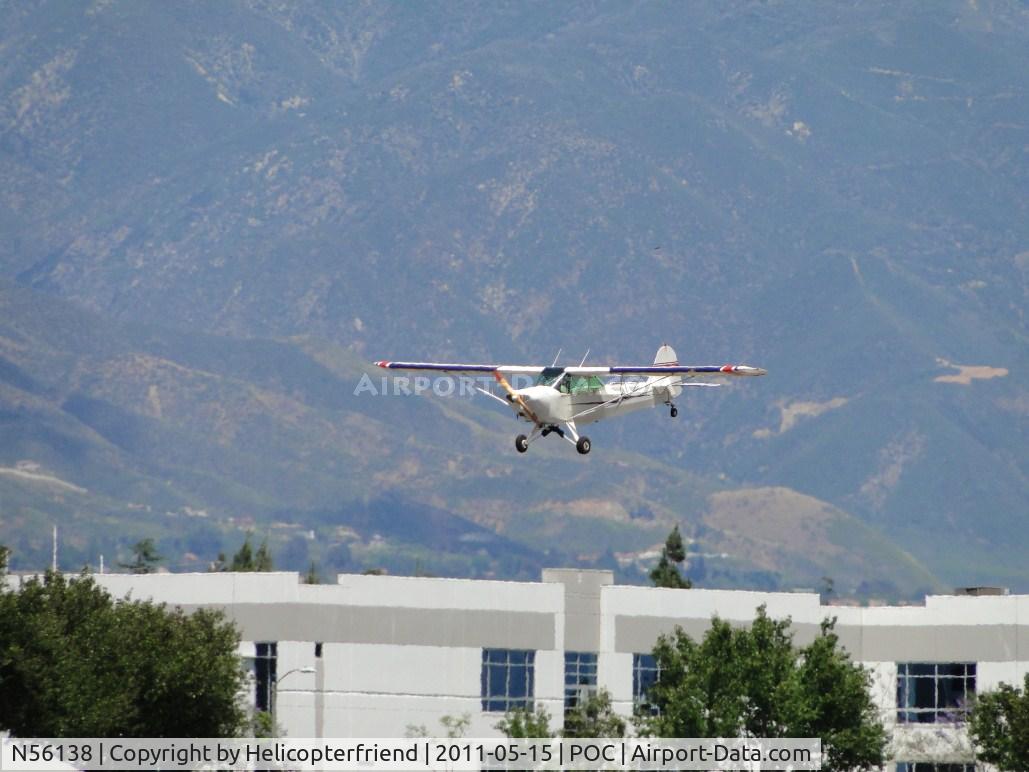 N56138, 1943 Taylorcraft DCO-65 C/N L-5719, On final to runway 26R doing touch & go's during extremely gusty winds