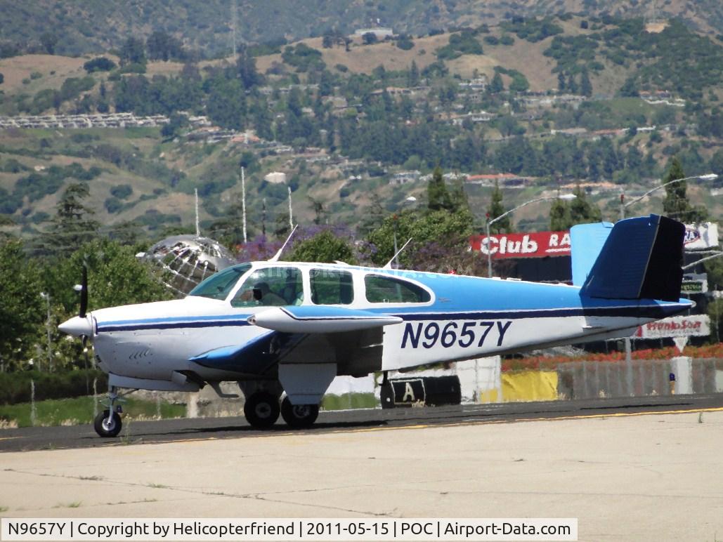 N9657Y, 1962 Beech P35 Bonanza C/N D-7072, Pre-flight before departing on runway 26L