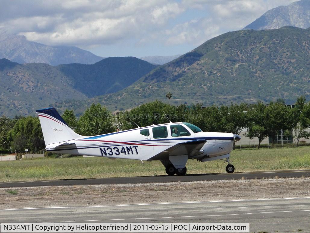 N334MT, 1962 Beech 35-B33 Debonair C/N CD-520, Taxiing to runway 26L on taxiway Sierra