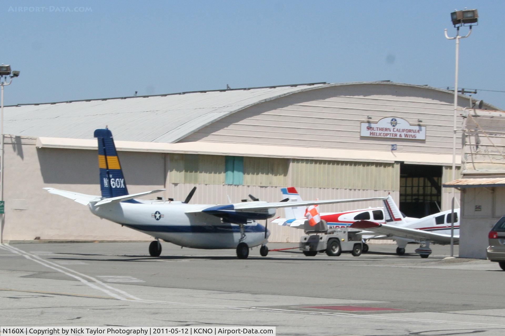 N160X, 1963 Aero Commander 500-B C/N 500B-1300-115, Being towed to the hangar