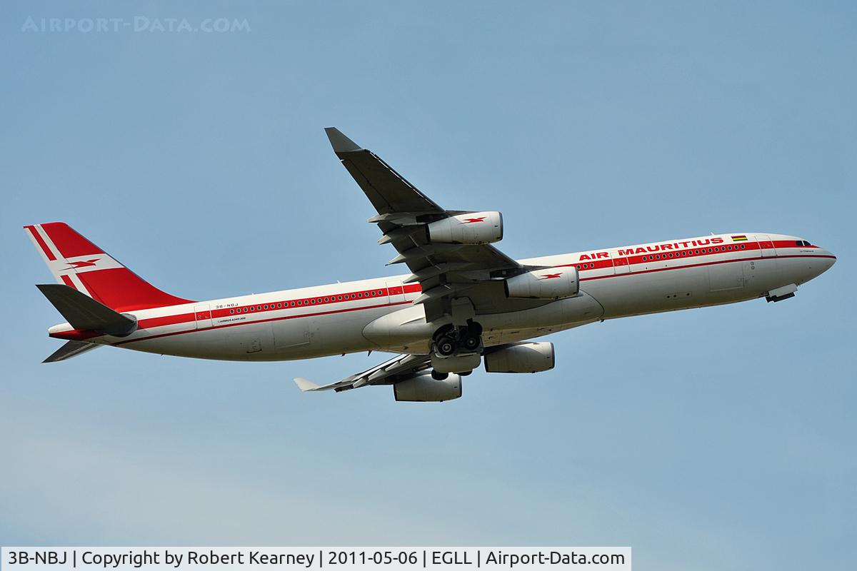3B-NBJ, 2006 Airbus A340-313E C/N 800, Retracting gear off 09R