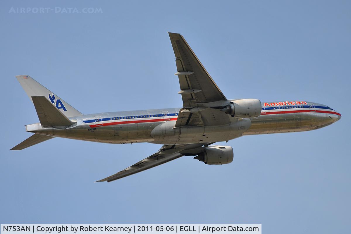 N753AN, 2001 Boeing 777-223 C/N 30261, Coming off r/w 09R