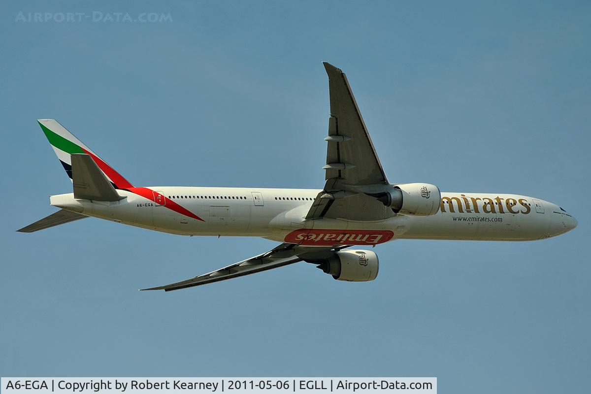 A6-EGA, 2010 Boeing 777-31H/ER C/N 38984, Coming off r/w 09R