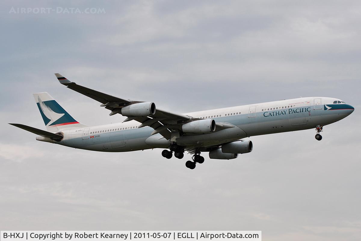 B-HXJ, Airbus A340-313 C/N 227, On short finals for r/w 9L