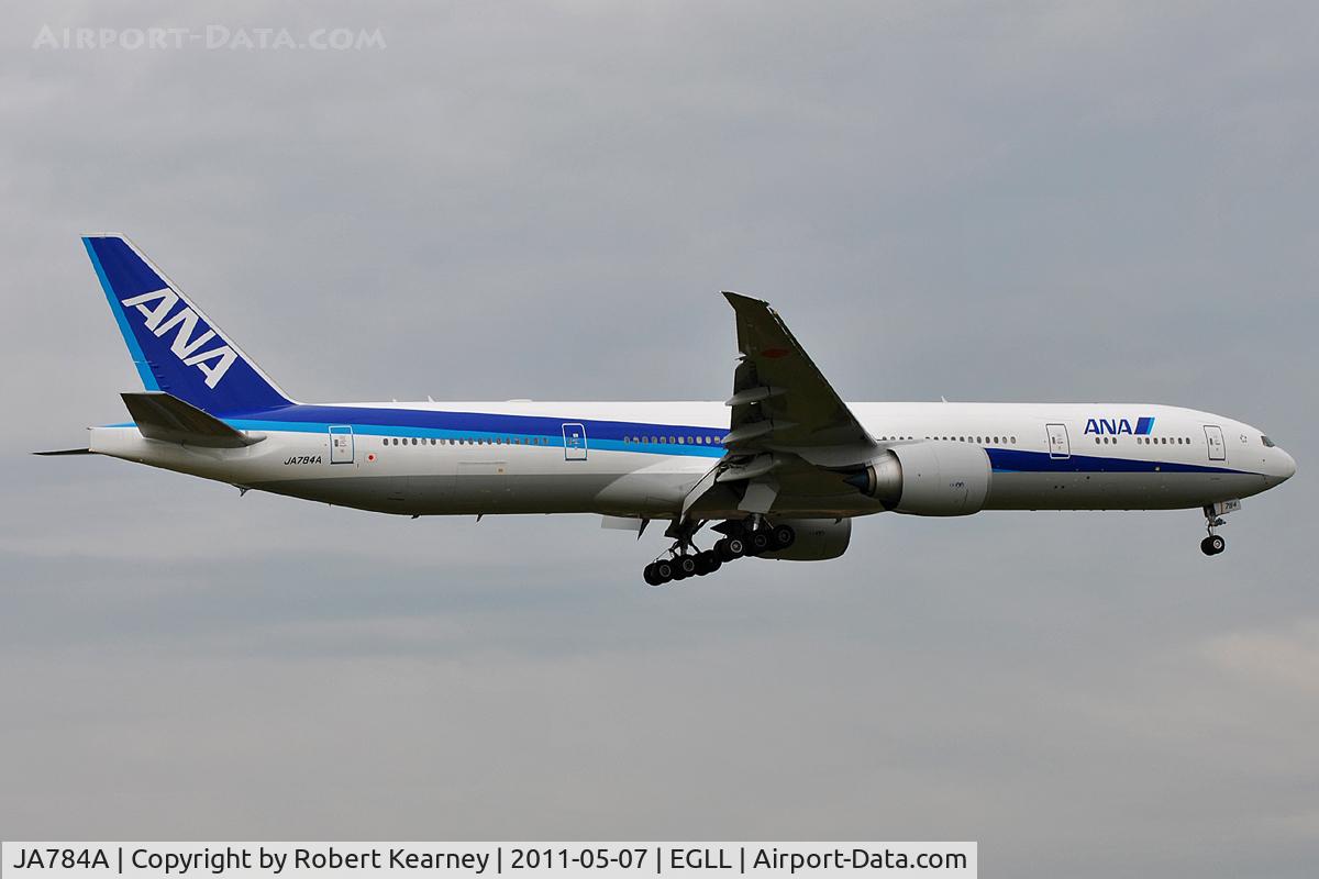 JA784A, 2009 Boeing 777-381/ER C/N 37950, On short finals for r/w 9L