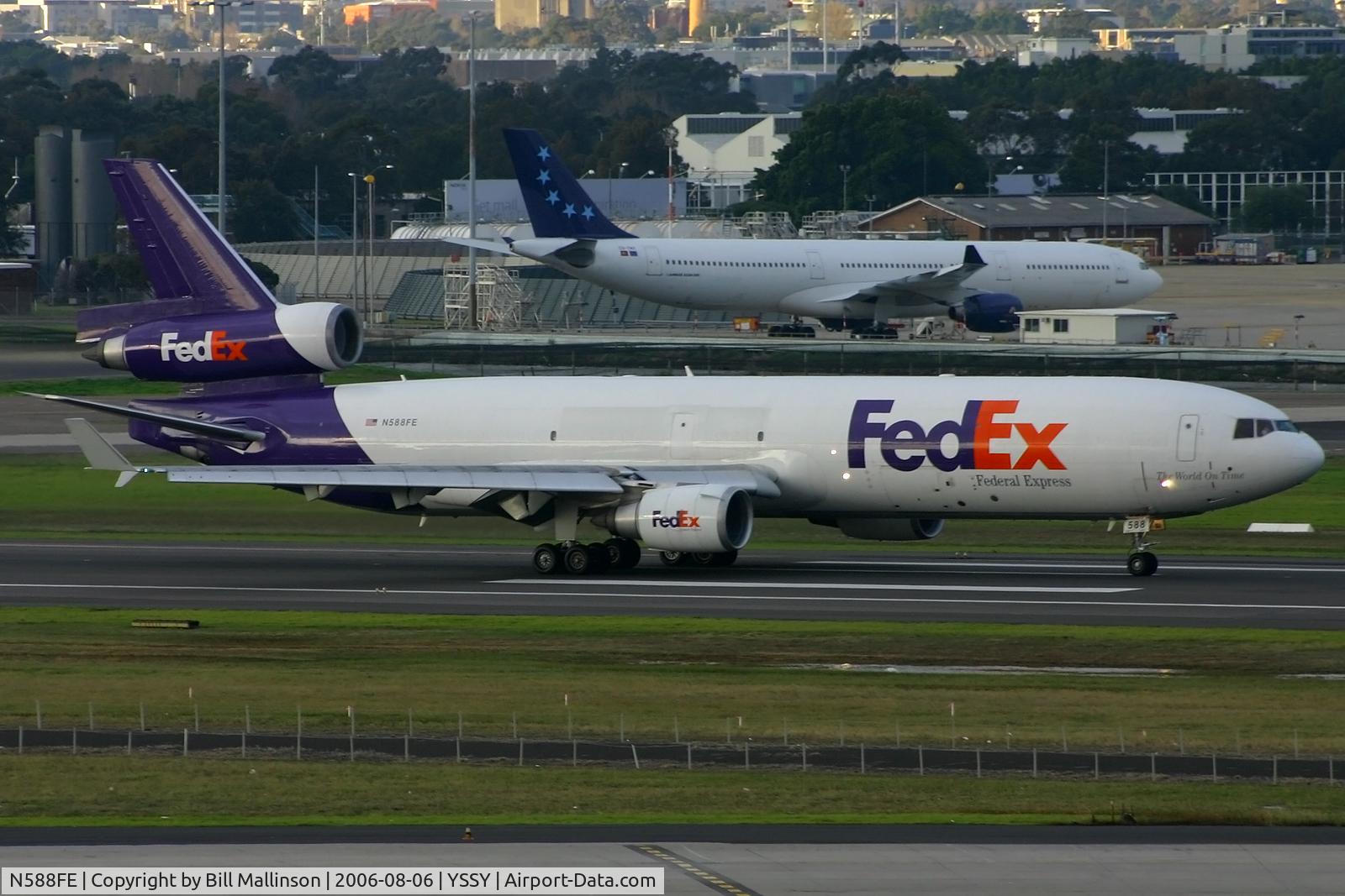 N588FE, 1992 McDonnell Douglas MD-11F C/N 48490, down onto 16R