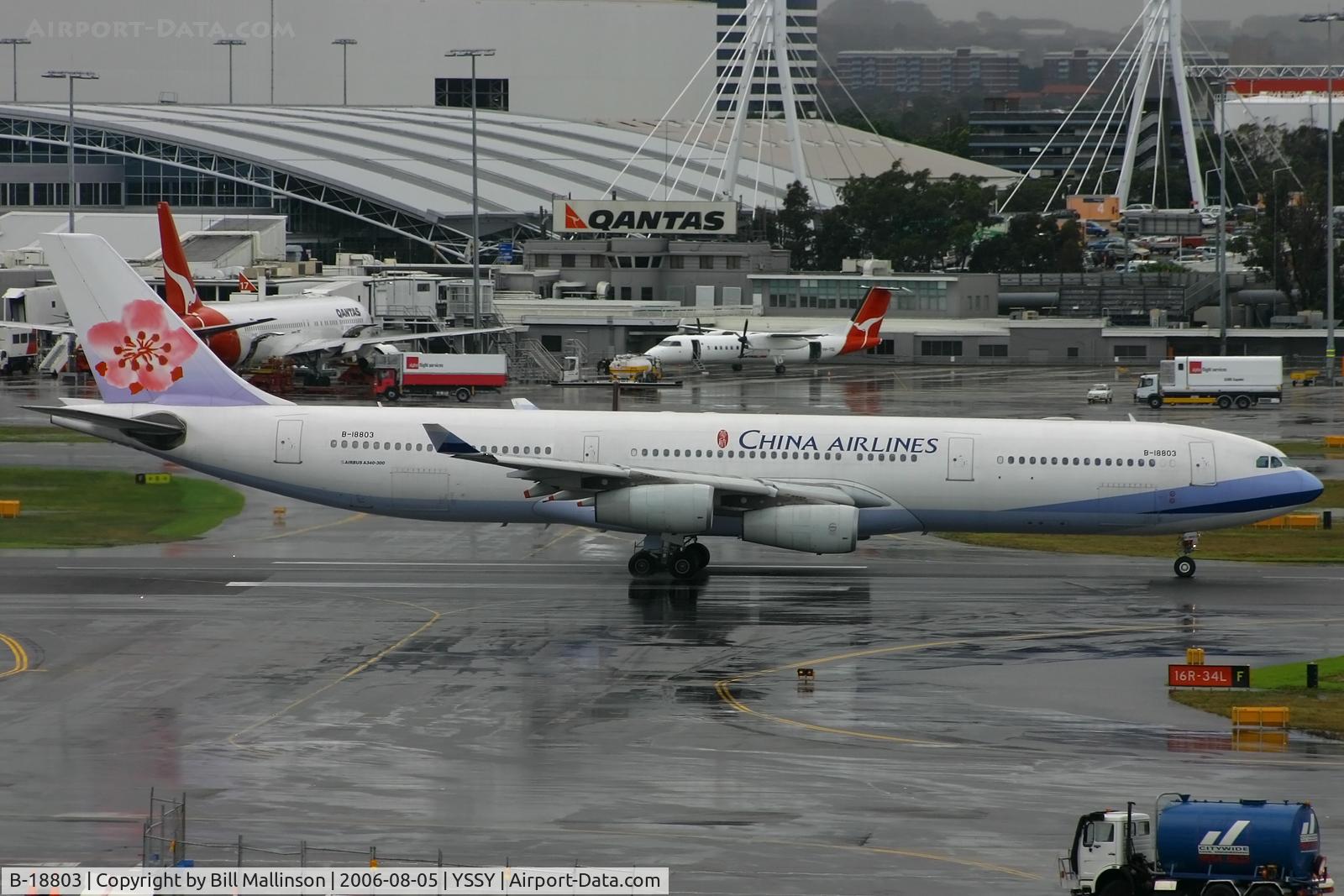 B-18803, 2001 Airbus A340-313 C/N 411, down onto a wet 16R