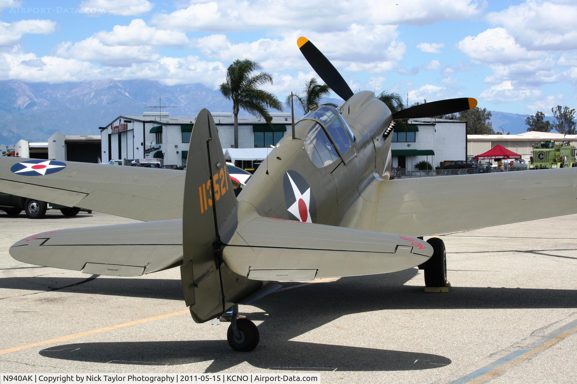 N940AK, 1941 Curtiss P-40E Warhawk C/N 15321, Parked at Chino during the Air Show