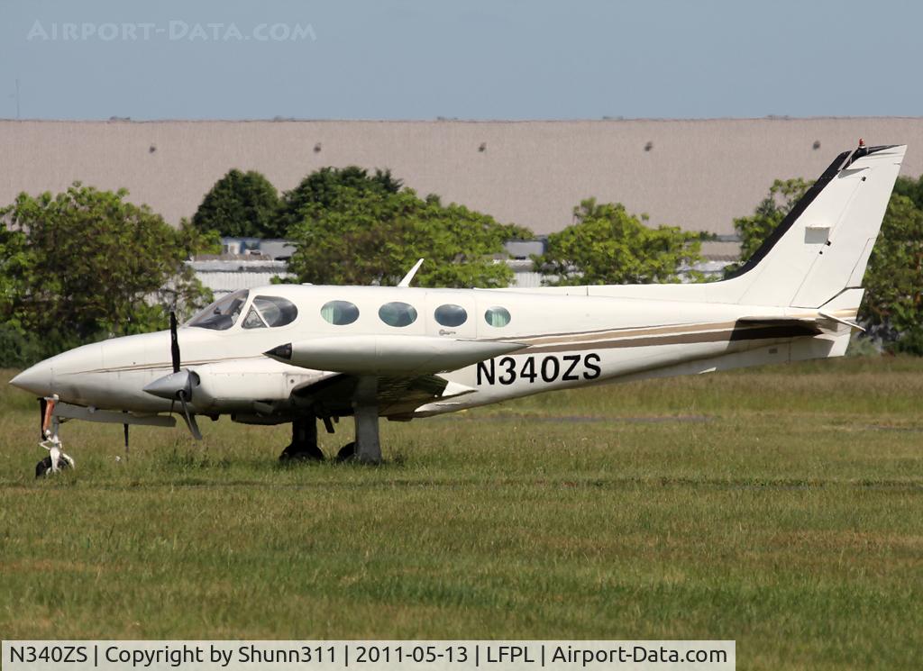 N340ZS, 1980 Cessna 340A C/N 340A0944, Parked on the grass...