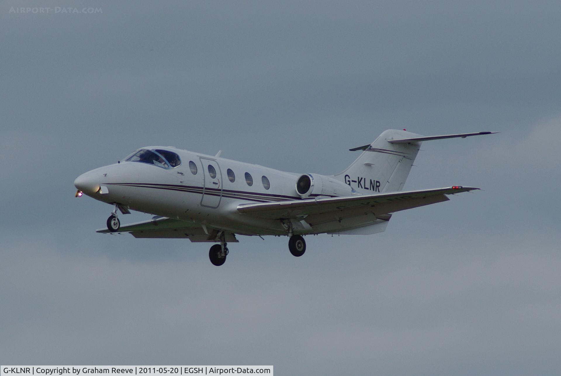 G-KLNR, 2009 Raytheon Hawker 400XP C/N RK-552, About to touch down.