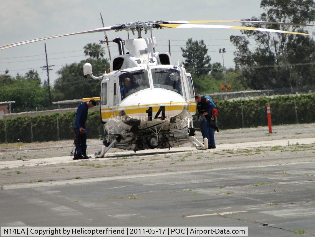 N14LA, 2005 Bell 412EP C/N 36393, Putting on their lift harnesses and getting ready for a rescue