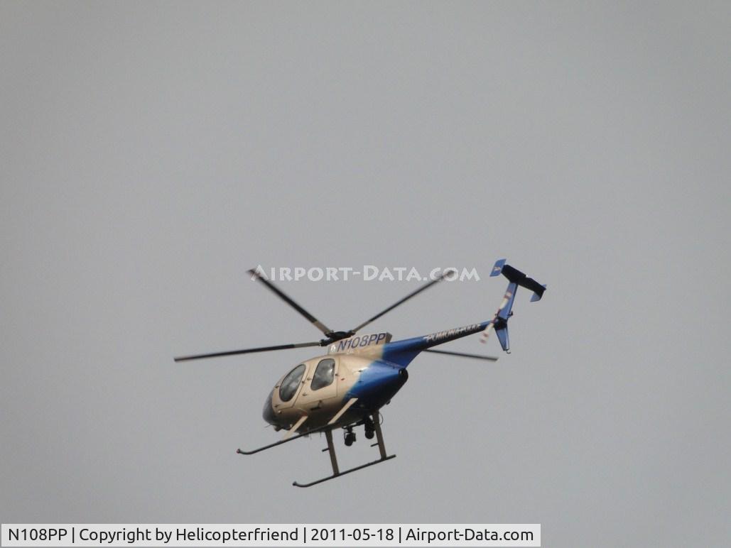 N108PP, 2008 MD Helicopters 369E C/N 0578E, Starting to orbit around 99L to land on the street for Pomona PD Centennial Open House, landing area 99L no longer listed