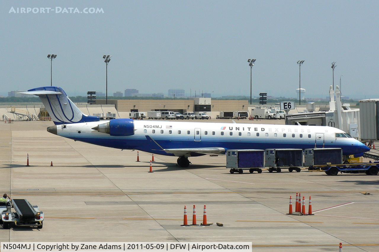 N504MJ, 2002 Bombardier CRJ-700 (CL-600-2C10) Regional Jet C/N 10066, United Express at the gate - DFW Airport, TX