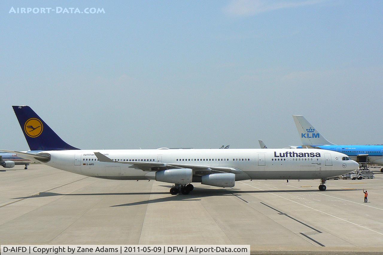 D-AIFD, 2001 Airbus A340-313X C/N 390, Lufthansa A340 arriving at the gate - DFW Airport, TX