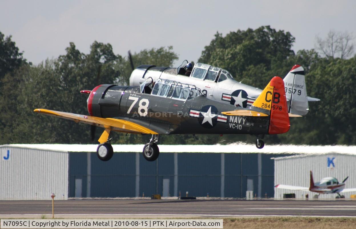 N7095C, North American AT-6D Texan C/N 42-84678, T-6s departing