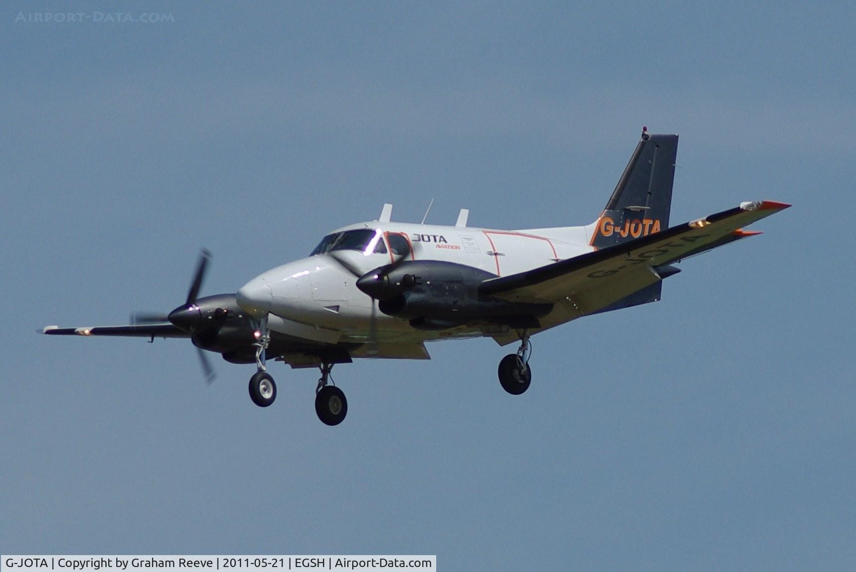 G-JOTA, 1968 Beech B90 King Air C/N LJ-327, About to touch down.