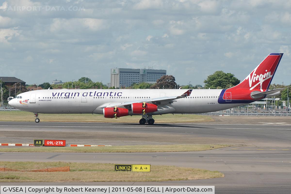 G-VSEA, 1992 Airbus A340-311 C/N 003, Applying reverse thrust on r/w 27R