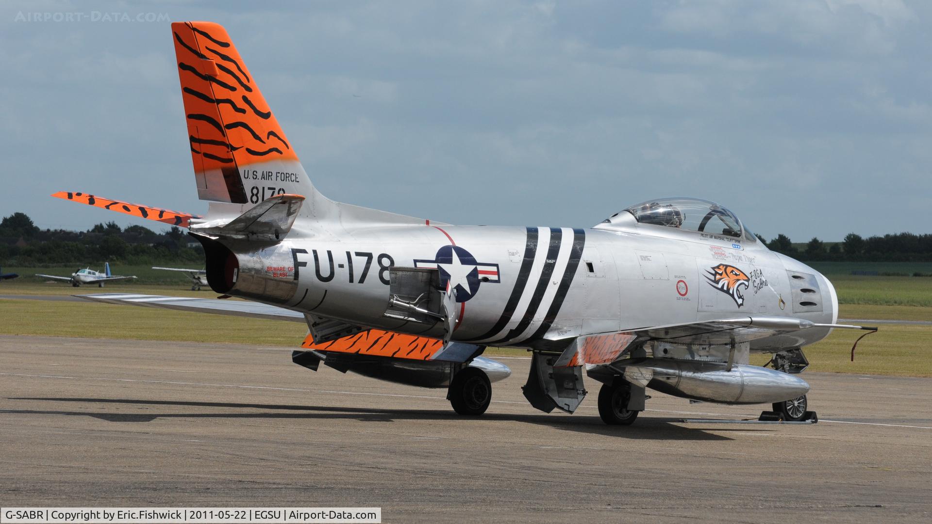 G-SABR, 1948 North American F-86A Sabre C/N 151-083 (151-43547), 2. G-SABR at Duxford's Spring Air Show, May 2011 with Tiger Meet scheme - Believed to be the oldest flying jet in the world.