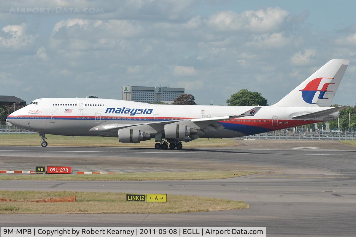 9M-MPB, 1993 Boeing 747-4H6 C/N 25699/965, Applying reverse thrust on r/w 27R