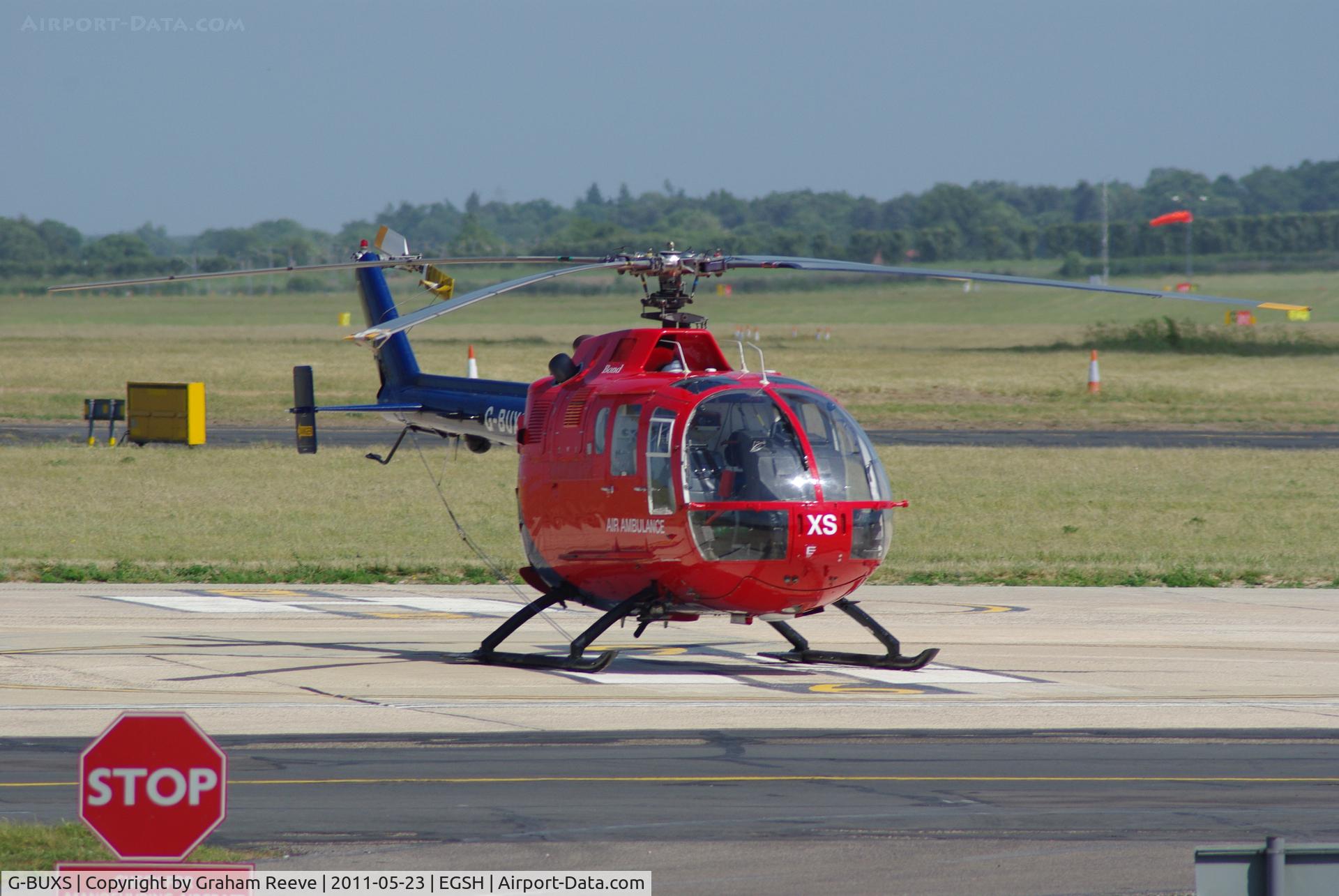 G-BUXS, 1993 MBB Bo.105DBS-4 C/N S.41/913, Parked in the sun.