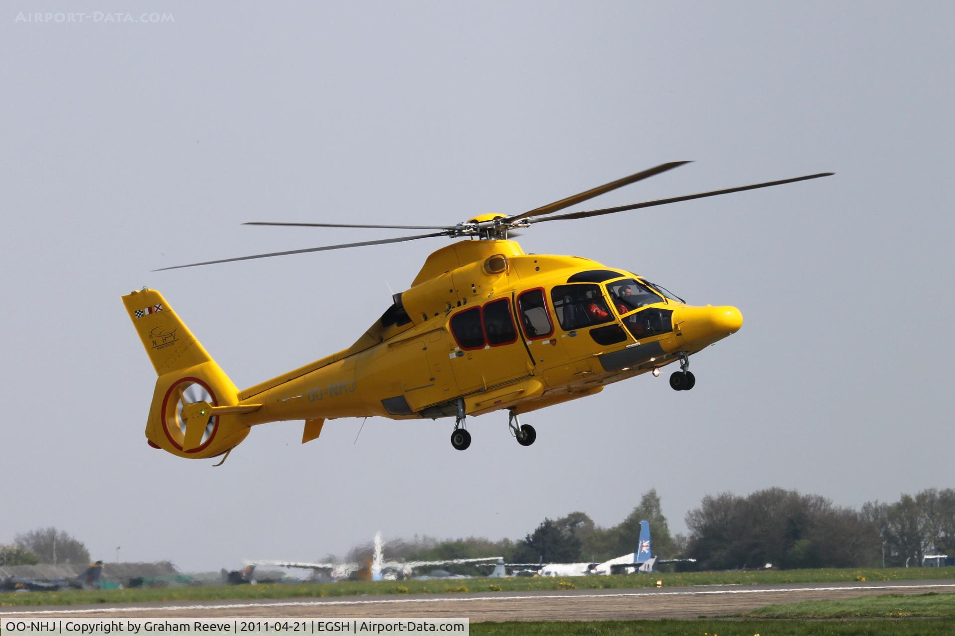 OO-NHJ, 2009 Eurocopter EC-155B-1 C/N 6842, About to touch down.