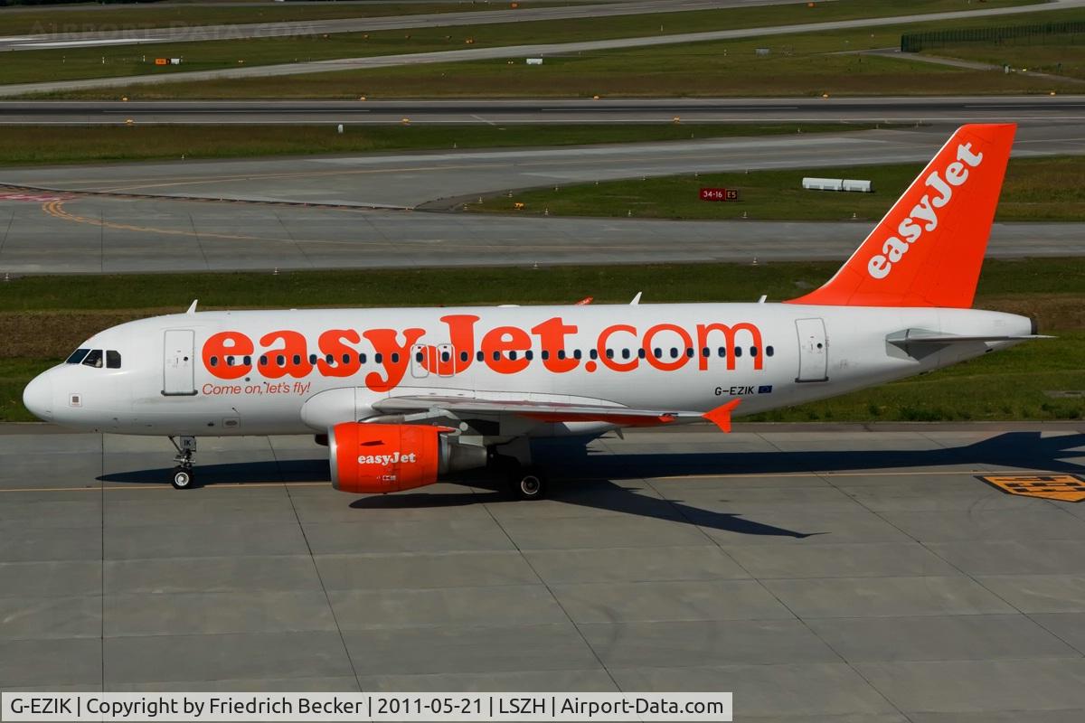 G-EZIK, 2005 Airbus A319-111 C/N 2481, taxying to the gate