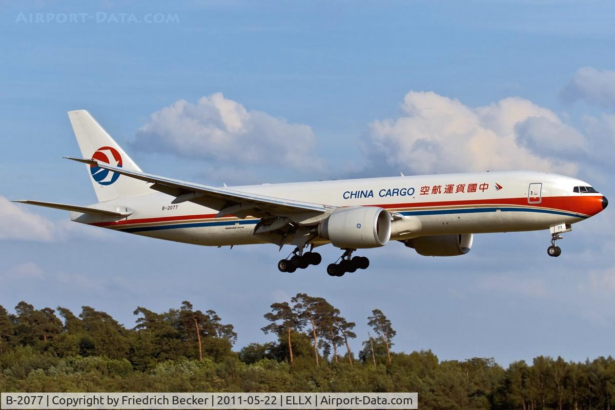 B-2077, 2010 Boeing 777-F6N C/N 37713, on final RW24