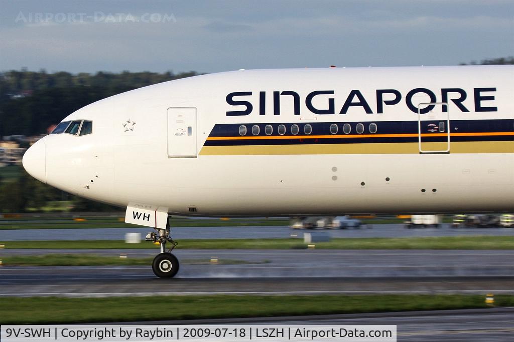 9V-SWH, 2007 Boeing 777-312/ER C/N 34573, Evening arrival, shortly after a heavy rainshower