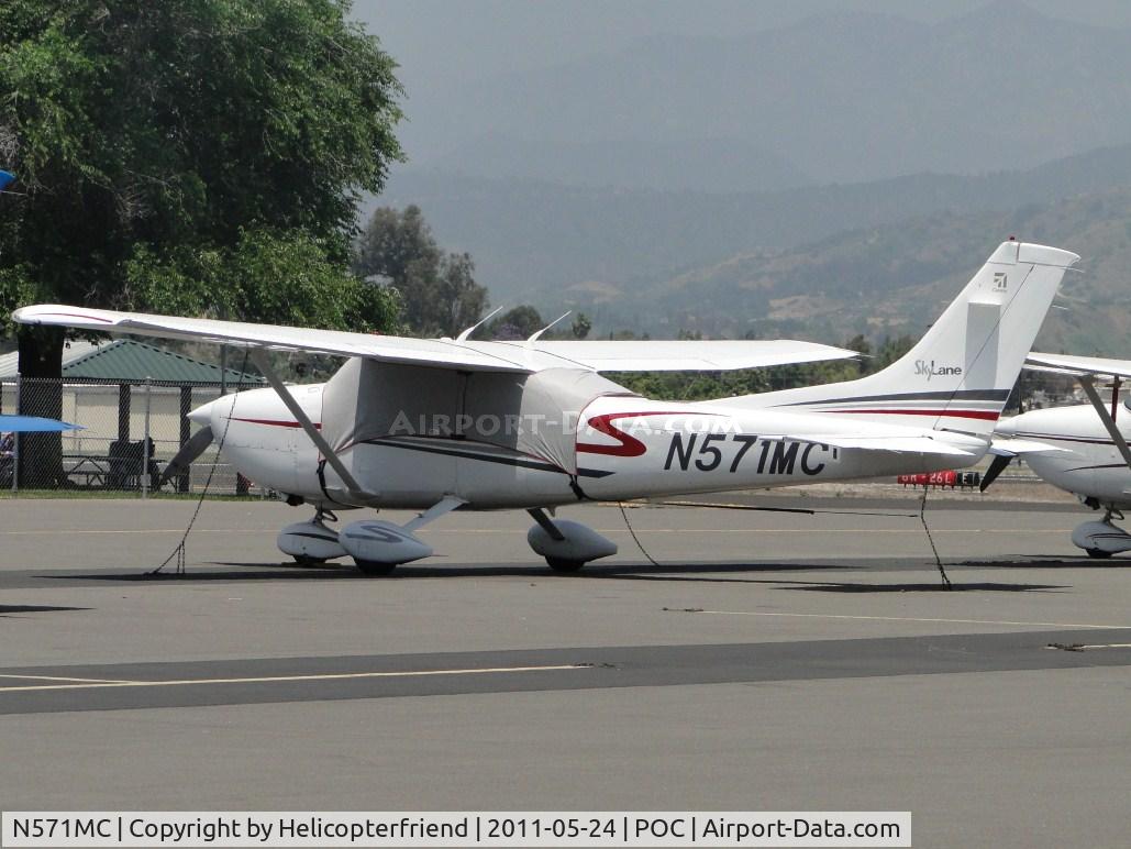 N571MC, 2001 Cessna 182T Skylane C/N 18281038, Shaded, tied down and parked in transient parking
