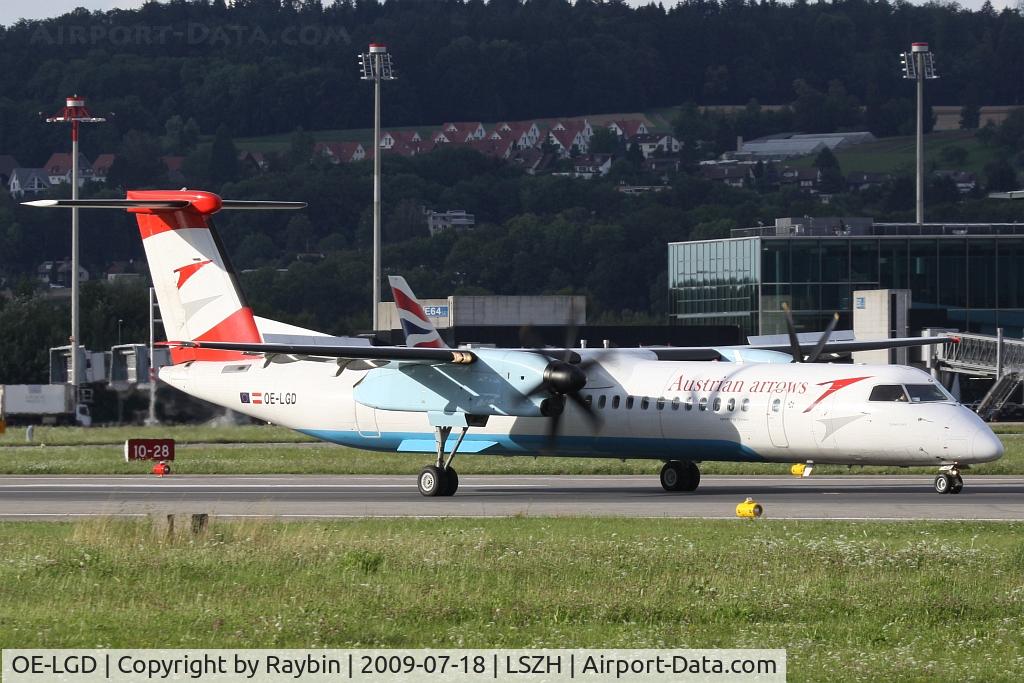 OE-LGD, 2000 De Havilland Canada DHC-8-402Q Dash 8 C/N 4027, taxiing to dock A