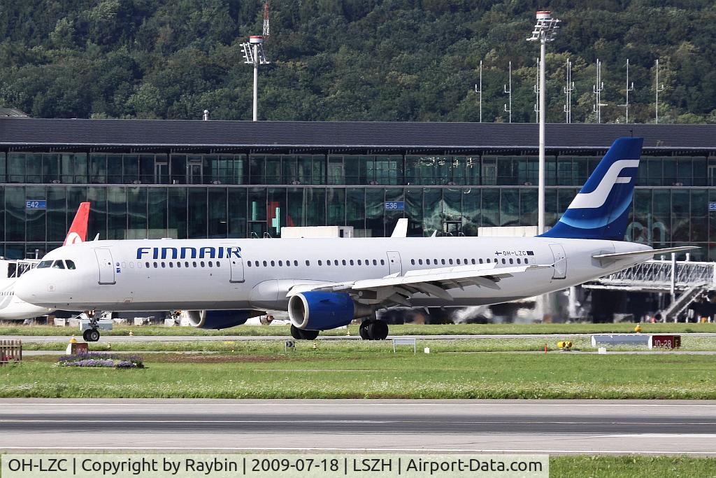 OH-LZC, 2000 Airbus A321-211 C/N 1185, landing during afternoon sunny period