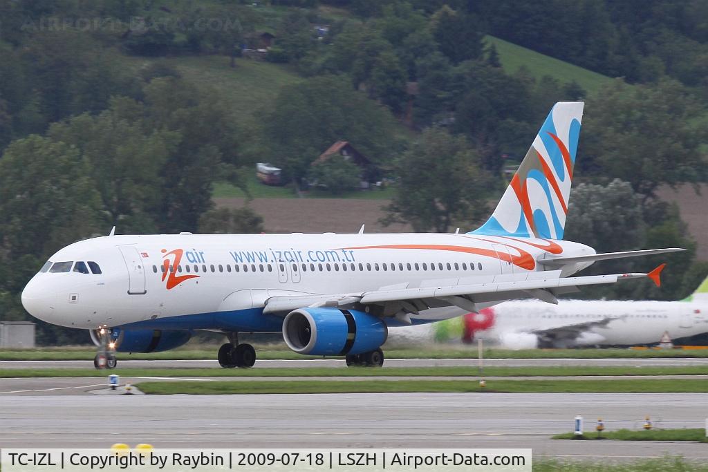 TC-IZL, 2002 Airbus A320-233 C/N 1730, TAP A320 in the background