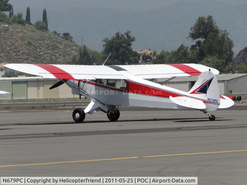 N679PC, 2006 Piper PA-18 Super Cub Replica C/N 01, Just landed and is now parked in transient parking