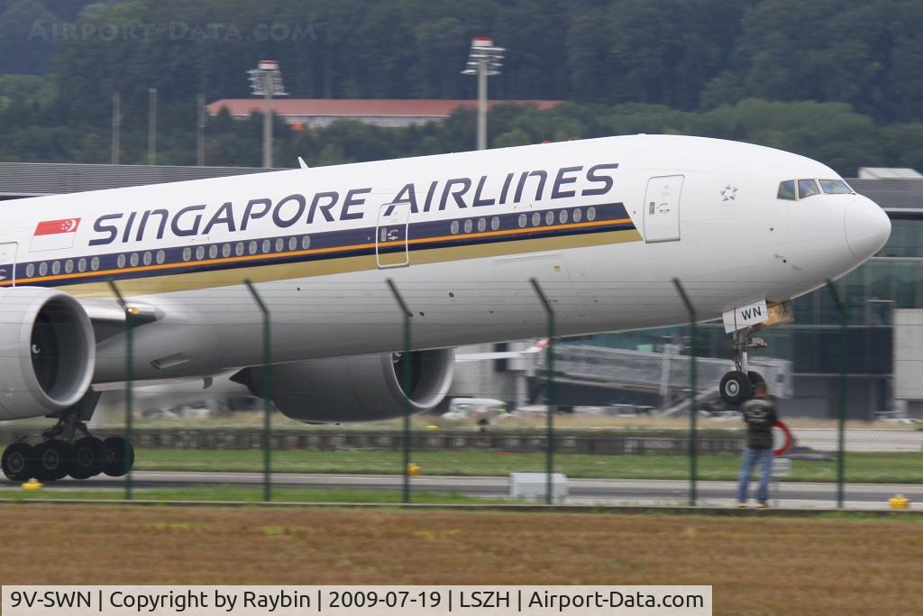 9V-SWN, 2008 Boeing 777-312/ER C/N 34579, man vs machine