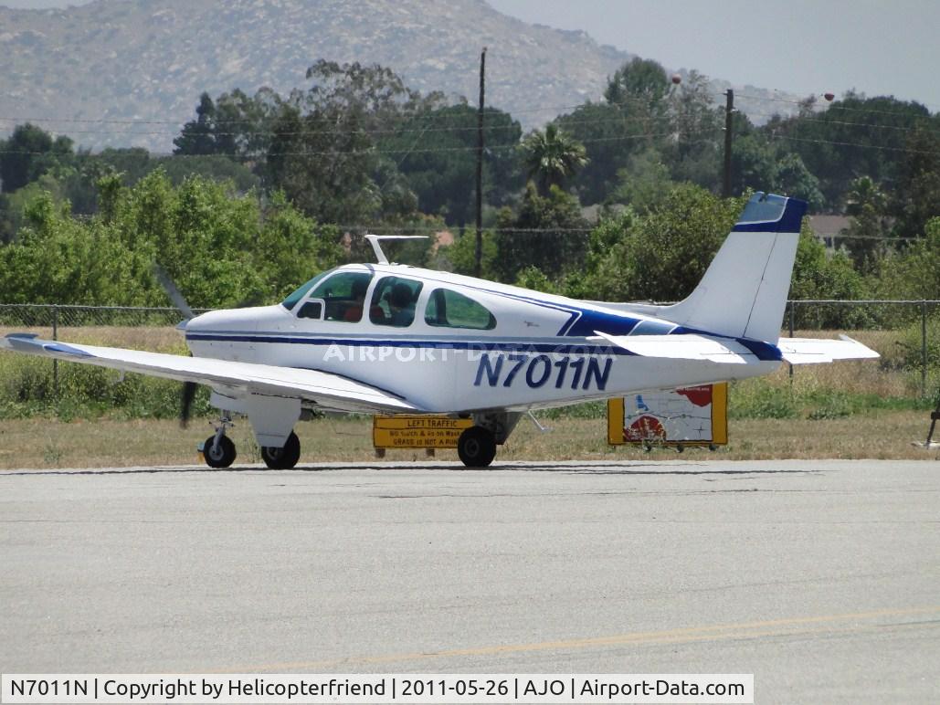 N7011N, 1967 Beech E33 Bonanza C/N CD-1123, Waiting to enter runway 25 for take off