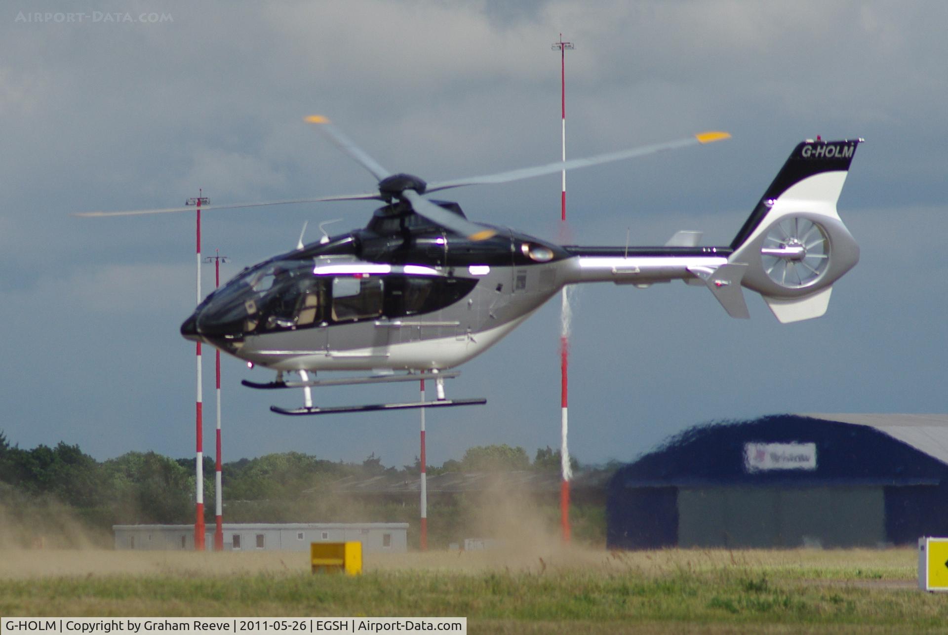 G-HOLM, 2007 Eurocopter EC-135T-2+ C/N 0574, Kicking up the dust.