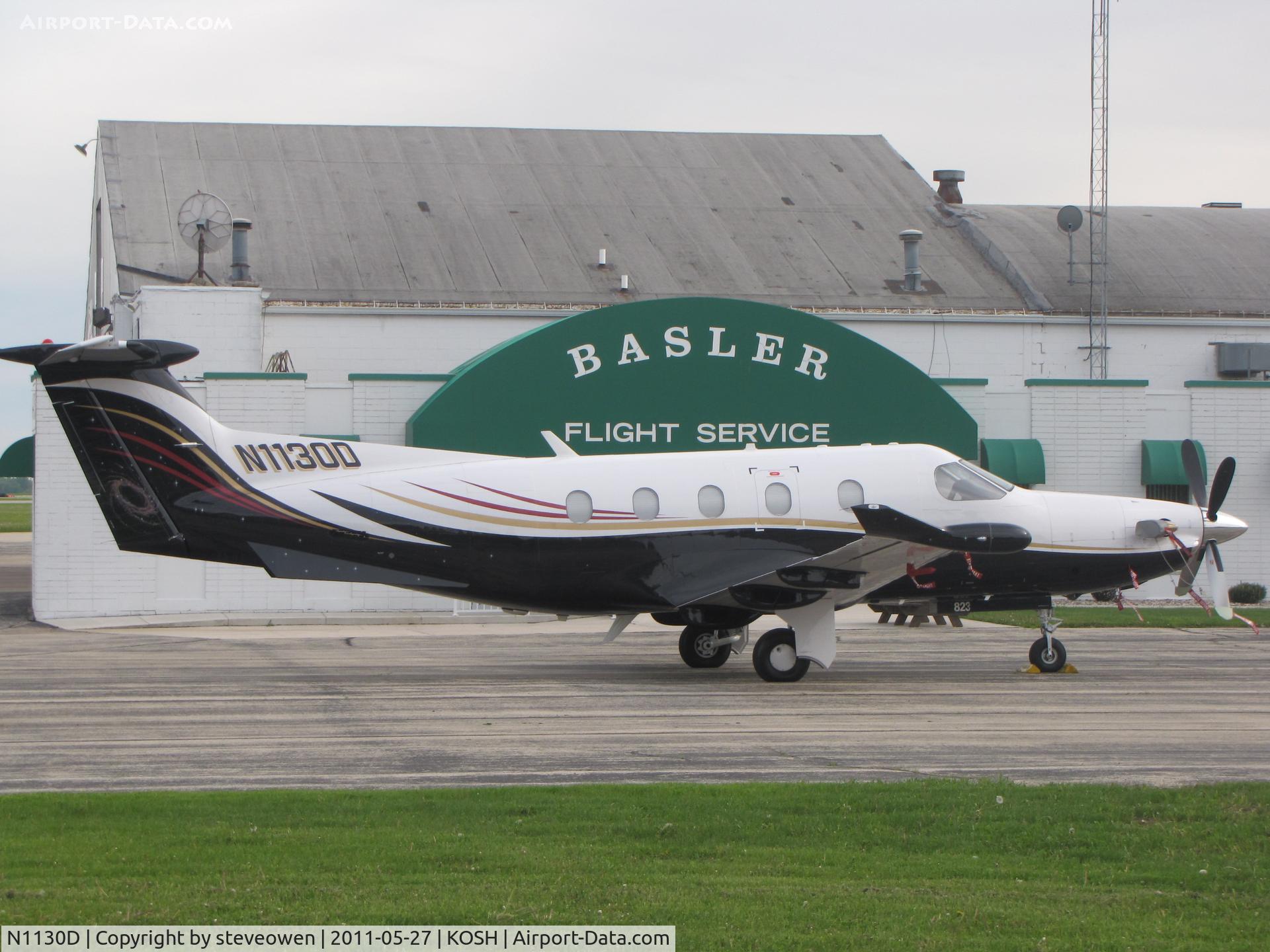 N1130D, 2007 Pilatus PC-12/47 C/N 823, On Basler FBO ramp @KOSH