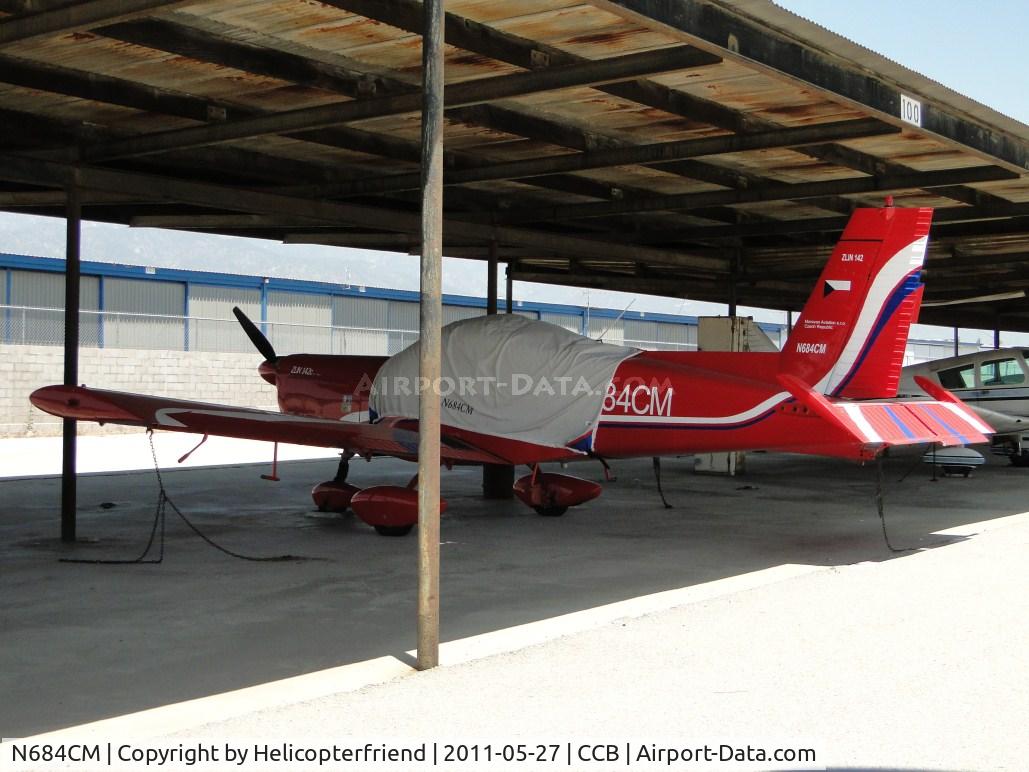 N684CM, 1980 Zlin Z-142C C/N 0218, Covered up, tied down and parked in the shade