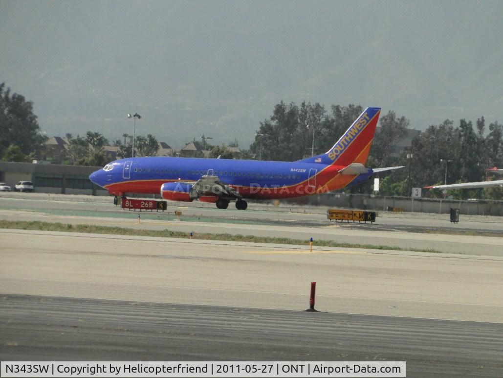 N343SW, 1989 Boeing 737-3H4 C/N 24151, Slowing down to turn back to Southwest terminal