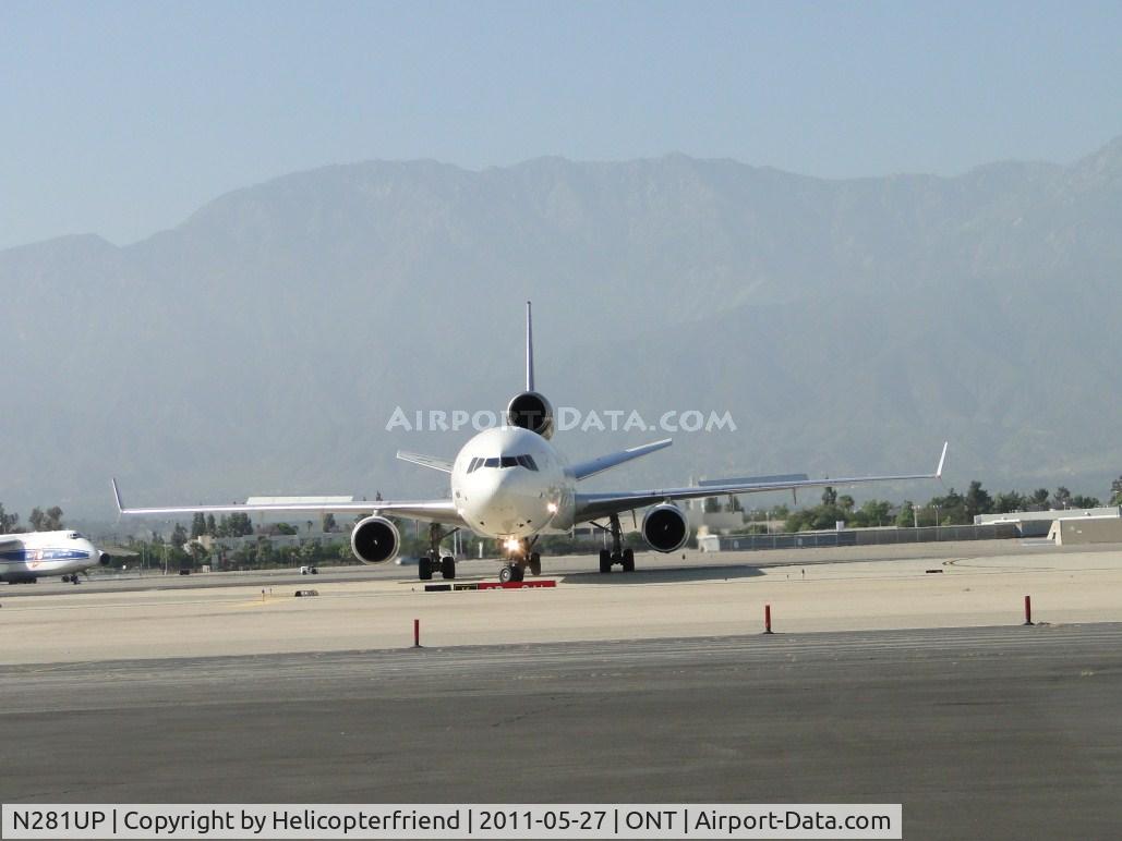 N281UP, 1993 McDonnell Douglas MD-11F C/N 48538, Turning onto taxiway Sierra for trip back to UPS area