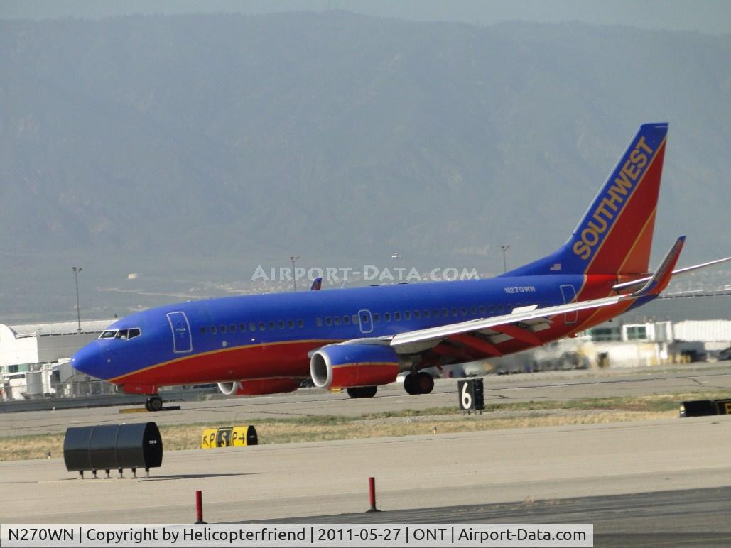 N270WN, 1998 Boeing 737-705 C/N 29089, Landing on runway 26L