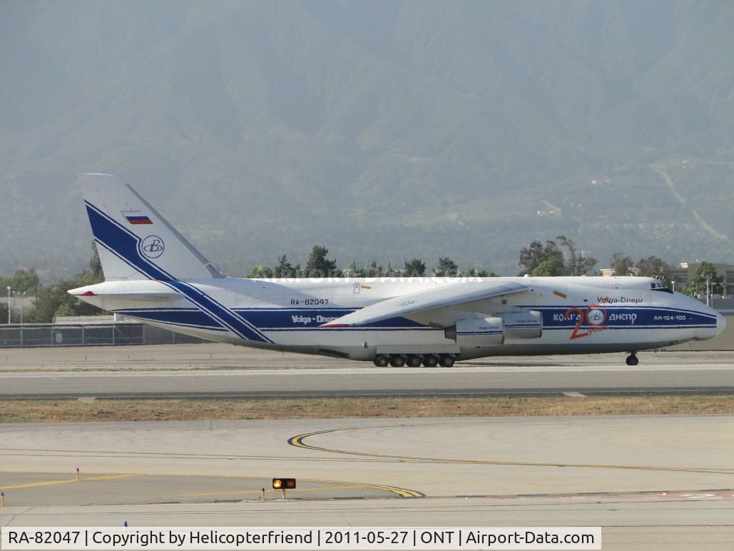 RA-82047, 1992 Antonov An-124-100 Ruslan C/N 9773053259121/0701, Taxiing eastbound on taxiway November heading to runway 26R