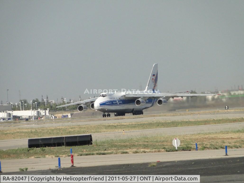 RA-82047, 1992 Antonov An-124-100 Ruslan C/N 9773053259121/0701, Rolling for take off on runway 26R