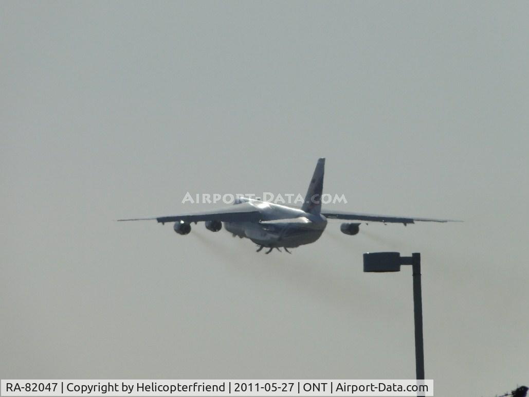 RA-82047, 1992 Antonov An-124-100 Ruslan C/N 9773053259121/0701, Wheels are retracted and ship is beginning it's 4 day flight to Malasia. There will be 4 fuel stops and 2 of those will be 14 hr crew lay-overs