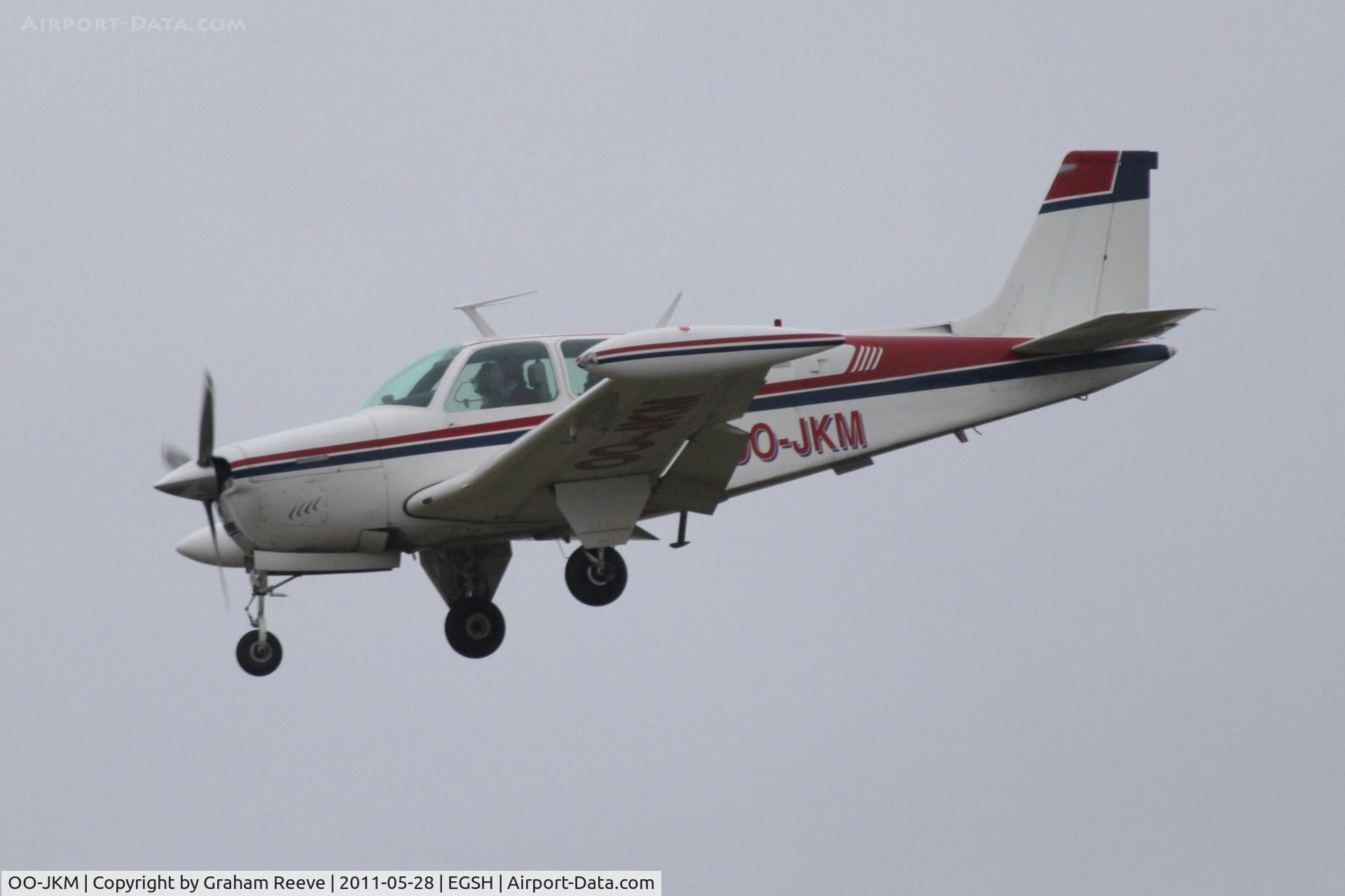 OO-JKM, 1974 Beech F33A Bonanza C/N CE487, About to touch down.