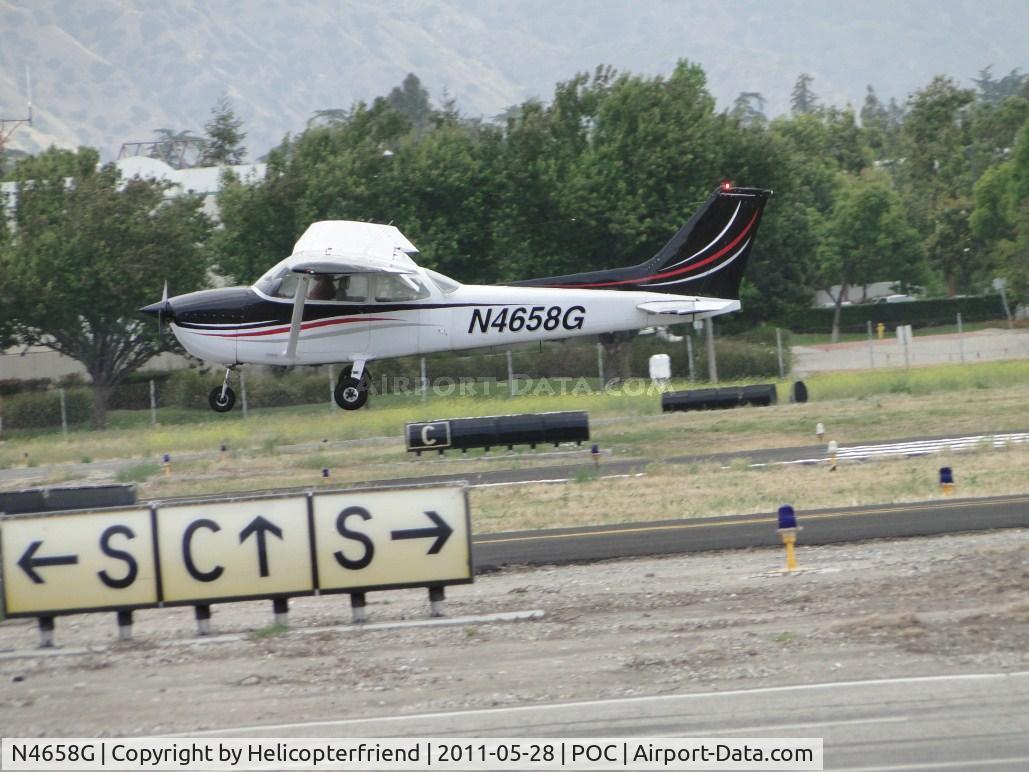 N4658G, Cessna 172N C/N 17273284, Strong gust of wind caused correction while landing on runway 26L