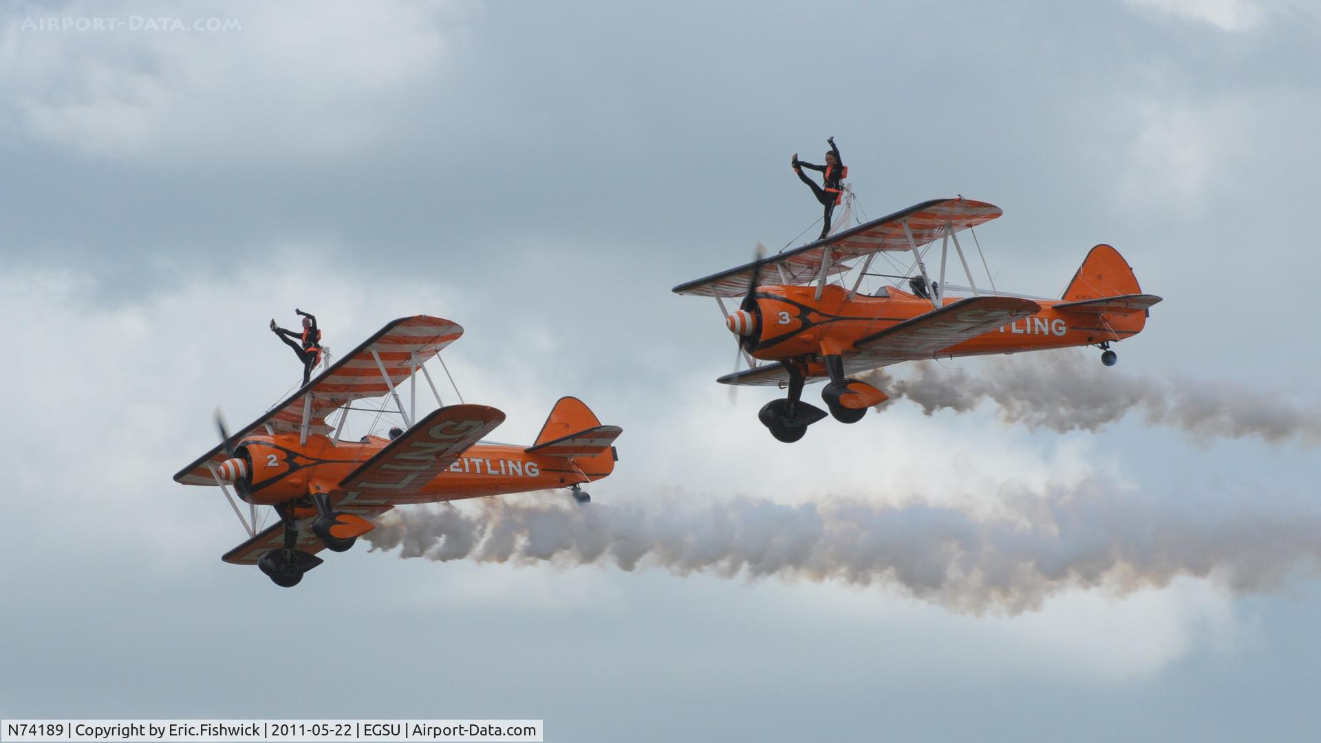 N74189, 1941 Boeing PT-17/R985 Kaydet (A75N1) C/N 75-717, N74189 (2) & N707TJ(3) working very hard in extremely blustery conditions at at Duxford's Spring Air Show, May 2011