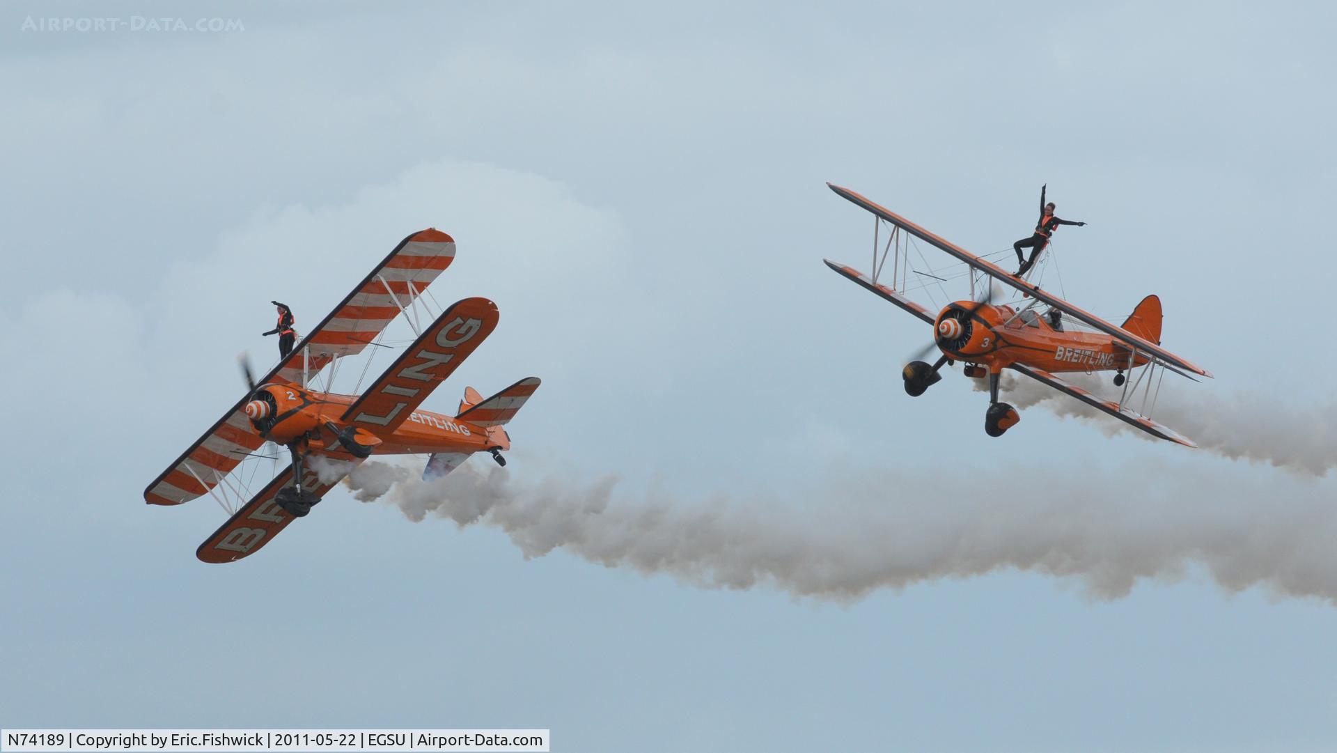 N74189, 1941 Boeing PT-17/R985 Kaydet (A75N1) C/N 75-717, N74189 (2) & N707TJ(3) working very hard in extremely blustery conditions at at Duxford's Spring Air Show, May 2011