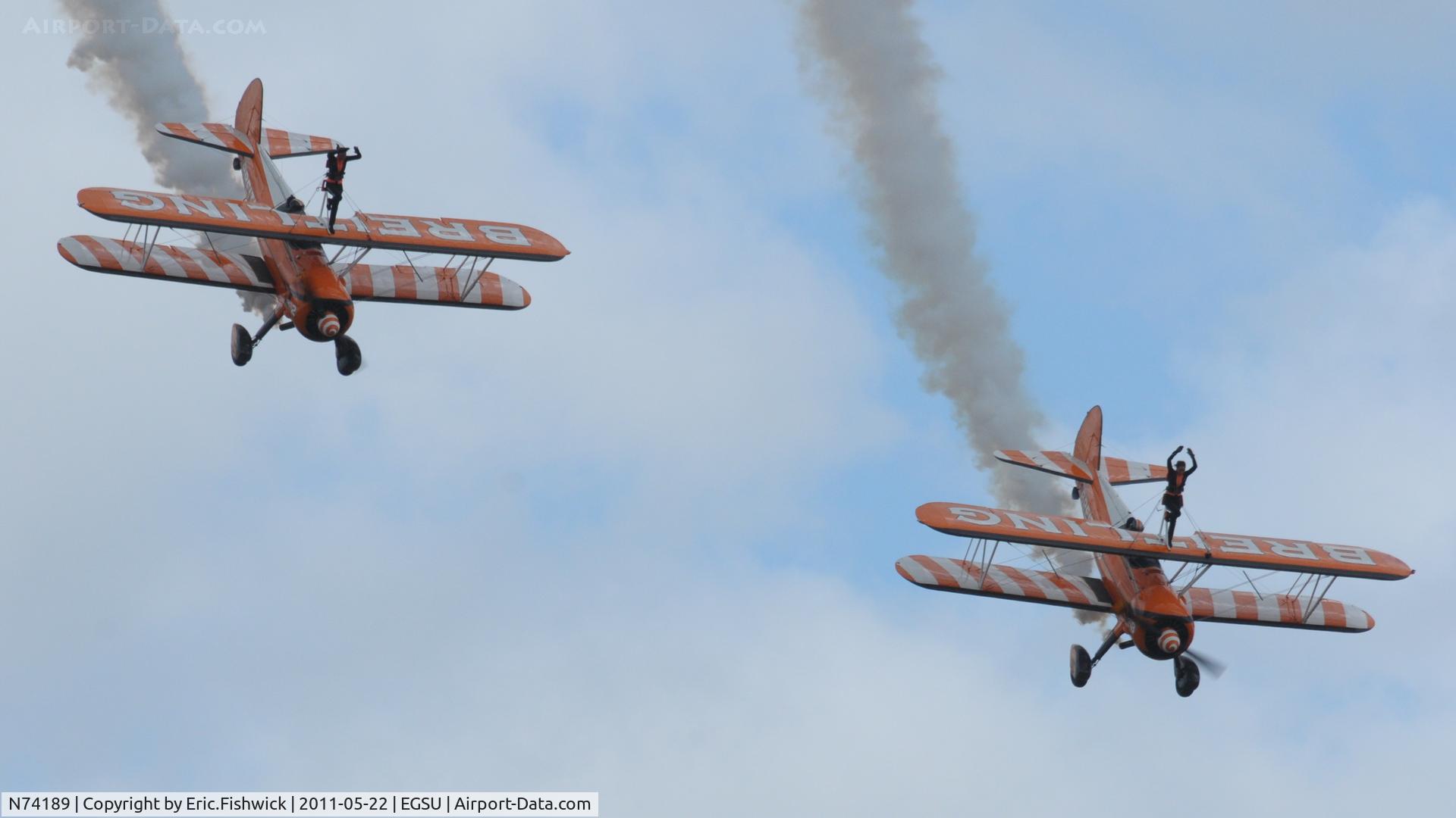 N74189, 1941 Boeing PT-17/R985 Kaydet (A75N1) C/N 75-717, N74189 (2) & N707TJ(3) working very hard in extremely blustery conditions at at Duxford's Spring Air Show, May 2011